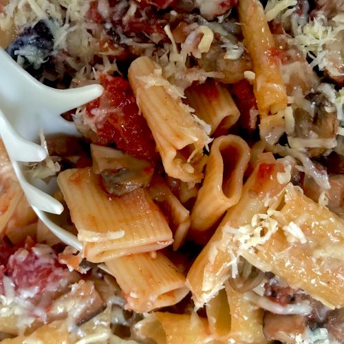 Rigatoni mushrooms with diced tomatoes